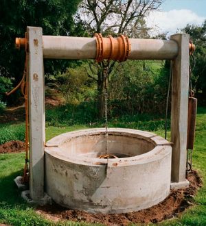 Обустройство типового колодца из бетонных колец на даче
