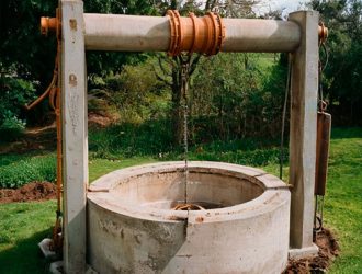 Обустройство типового колодца из бетонных колец на даче