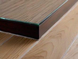 Идеальный стык: как правильно соединить плитку и ламинат в интерьере вашего дома